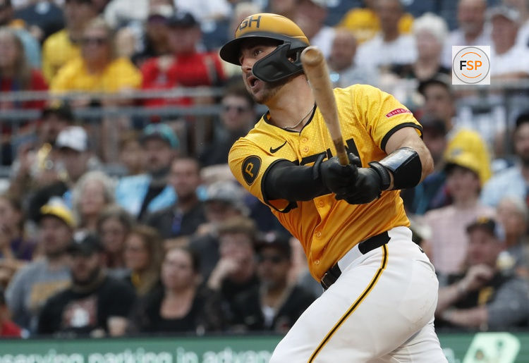 Aug 2, 2024; Pittsburgh, Pennsylvania, USA;  Pittsburgh Pirates catcher Joey Bart (14) hits an RBI single against the Arizona Diamondbacks during the fourth inning at PNC Park. Credit: Charles LeClaire-USA TODAY Sports