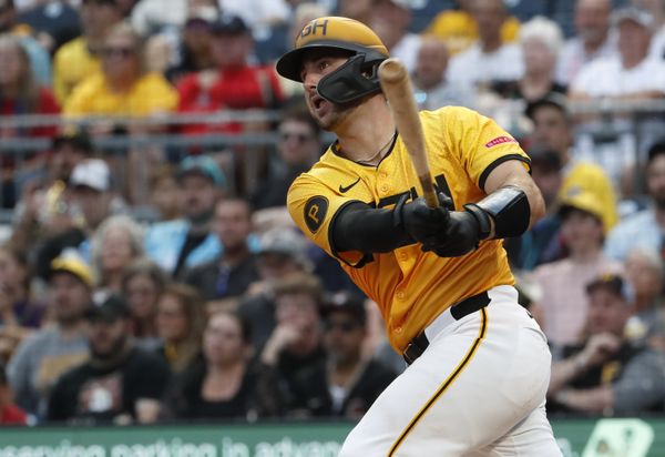 Aug 2, 2024; Pittsburgh, Pennsylvania, USA;  Pittsburgh Pirates catcher Joey Bart (14) hits an RBI single against the Arizona Diamondbacks during the fourth inning at PNC Park. Credit: Charles LeClaire-USA TODAY Sports