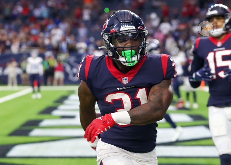 HOUSTON, TX - OCTOBER 30:  Houston Texans running back Dameon Pierce (31) celebrates after scoring a touchdown in the fourth quarter during the NFL game between the Tennessee Titans and Houston Texans on October 30, 2022 at NRG Stadium in Houston, Texas.  (Photo by Leslie Plaza Johnson/Icon Sportswire)