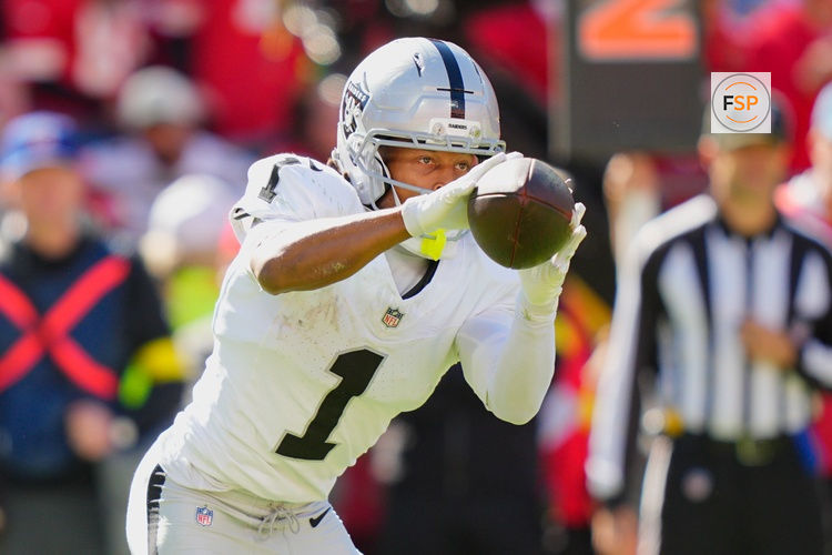 Oct 19, 2025; Kansas City, Missouri, USA; Las Vegas Raiders wide receiver Tre Tucker (1) makes a reception against the Kansas City Chiefs during the third quarter of the game at GEHA Field at Arrowhead Stadium. Credit: Jay Biggerstaff-Imagn Images
