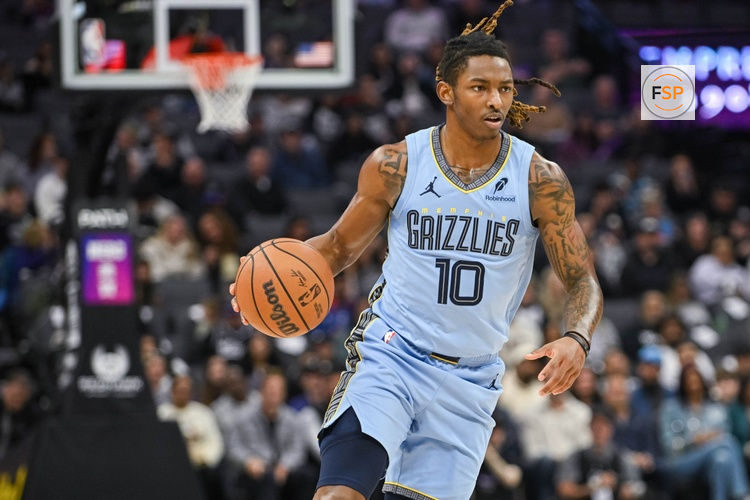 Feb 4, 2026; Sacramento, California, USA; Memphis Grizzlies guard Javon Small (10) dribbles against the Sacramento Kings during the second quarter at Golden 1 Center. Credit: Ed Szczepanski-Imagn Images