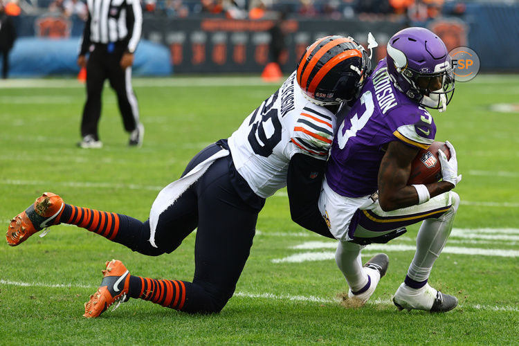 Nov 24, 2024; Chicago, Illinois, USA; Minnesota Vikings wide receiver Jordan Addison (3) makes a catch against Chicago Bears cornerback Tyrique Stevenson (29) during the second half at Soldier Field. Credit: Mike Dinovo-Imagn Images