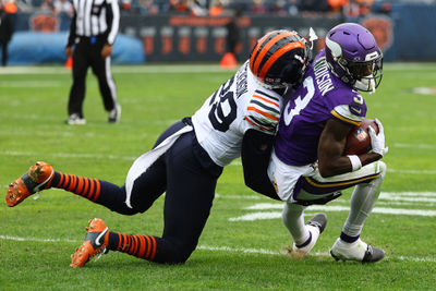 Nov 24, 2024; Chicago, Illinois, USA; Minnesota Vikings wide receiver Jordan Addison (3) makes a catch against Chicago Bears cornerback Tyrique Stevenson (29) during the second half at Soldier Field. Mandatory Credit: Mike Dinovo-Imagn Images