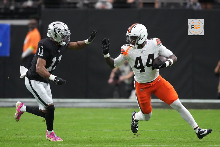Nov 23, 2025; Paradise, Nevada, USA;  Cleveland Browns tight end Harold Fannin Jr. (44) runs against Las Vegas Raiders safety Jeremy Chinn (11) in the first half at Allegiant Stadium. Credit: Kirby Lee-Imagn Images