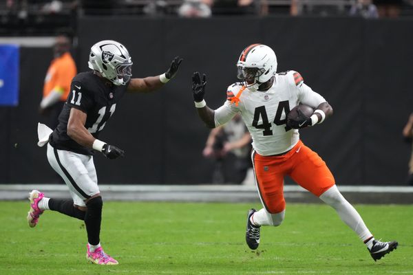Nov 23, 2025; Paradise, Nevada, USA;  Cleveland Browns tight end Harold Fannin Jr. (44) runs against Las Vegas Raiders safety Jeremy Chinn (11) in the first half at Allegiant Stadium. Mandatory Credit: Kirby Lee-Imagn Images