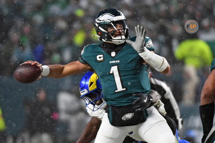 Jan 19, 2025; Philadelphia, Pennsylvania, USA; Philadelphia Eagles quarterback Jalen Hurts (1) throws a pass against the Los Angeles Rams in a 2025 NFC divisional round game at Lincoln Financial Field. Credit: Eric Hartline-Imagn Images