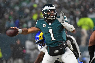 Jan 19, 2025; Philadelphia, Pennsylvania, USA; Philadelphia Eagles quarterback Jalen Hurts (1) throws a pass against the Los Angeles Rams in a 2025 NFC divisional round game at Lincoln Financial Field. Mandatory Credit: Eric Hartline-Imagn Images