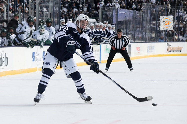 Jan 31, 2026; State College, PA, USA; Penn State Nittany Lions forward Gavin McKenna (72) looks to shoot the puck during the first period against the Michigan State Spartans at Beaver Stadium. Credit: Matthew O'Haren-Imagn Images