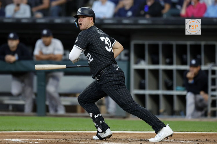 Aug 12, 2024; Chicago, Illinois, USA; Chicago White Sox outfielder Gavin Sheets (32) hits a RBI double against the New York Yankees during the first inning at Guaranteed Rate Field. Credit: Kamil Krzaczynski-USA TODAY Sports