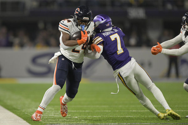 MINNEAPOLIS, MN - NOVEMBER 27: Chicago Bears running back Khalil Herbert (24) is knocked out of bounds by Minnesota Vikings defensive back Byron Murphy (7) during an NFL game between the Minnesota Vikings and Chicago Bears on November 27, 2023, at U.S. Bank Stadium in Minneapolis, MN. (Photo by Nick Wosika/Icon Sportswire)