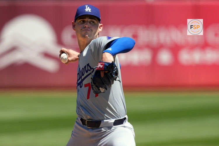 Aug 4, 2024; Oakland, California, USA; Los Angeles Dodgers starting pitcher River Ryan (77) throws a pitch against the Oakland Athletics during the fourth inning at Oakland-Alameda County Coliseum. Credit: Darren Yamashita-USA TODAY Sports