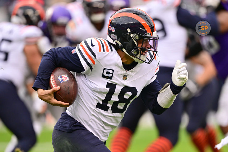 Nov 24, 2024; Chicago, Illinois, USA; Chicago Bears quarterback Caleb Williams (18) runs the ball against the Minnesota Vikings during the fourth quarter at Soldier Field. Credit: Daniel Bartel-Imagn Images