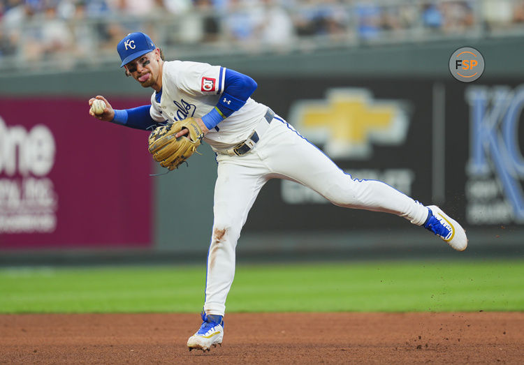 Aug 24, 2024; Kansas City, Missouri, USA; Kansas City Royals shortstop Bobby Witt Jr. (7) throws to first base during the fifth inning against the Philadelphia Phillies at Kauffman Stadium. Credit: Jay Biggerstaff-Imagn Images