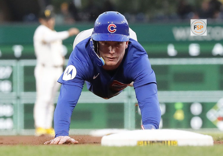 Aug 26, 2024; Pittsburgh, Pennsylvania, USA;  Chicago Cubs center fielder Pete Crow-Armstrong (52) steals third base against the Pittsburgh Pirates during the fourth inning at PNC Park. Credit: Charles LeClaire-USA TODAY Sports