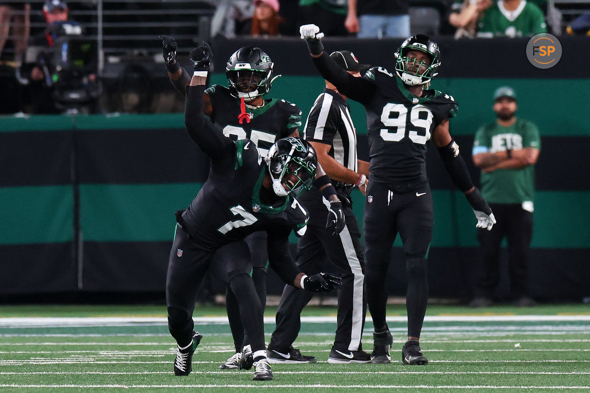 Oct 31, 2024; East Rutherford, New Jersey, USA; New York Jets defensive end Haason Reddick (7) celebrates a sack against the Houston Texans during the second half at MetLife Stadium. Credit: Ed Mulholland-Imagn Images