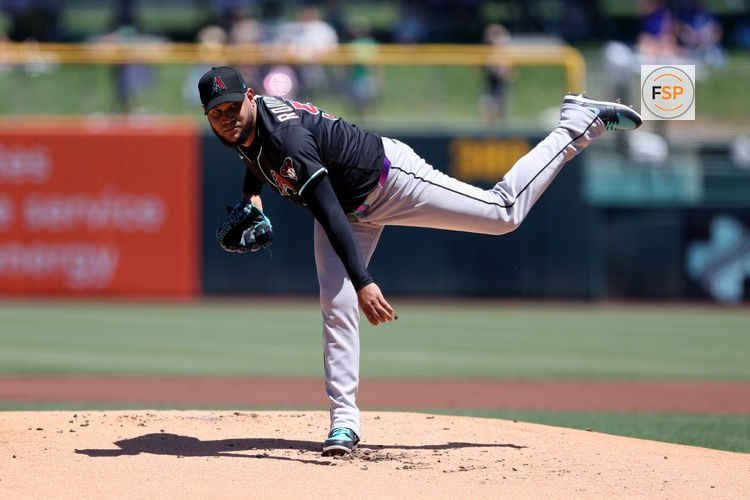 Aug 3, 2025; West Sacramento, California, USA; Arizona Diamondbacks starting pitcher Eduardo Rodriguez (57) throws a pitch against the Athletics during the first inning at Sutter Health Park. Credit: Dennis Lee-Imagn Images