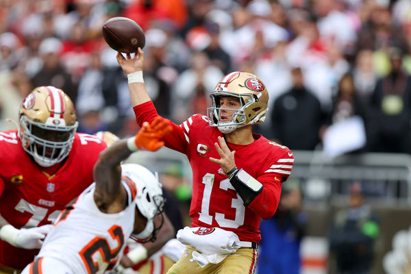 CLEVELAND, OH - OCTOBER 15: San Francisco 49ers quarterback Brock Purdy (13) throws under pressure during the fourth quarter of the National Football League game between the San Francisco 49ers and Cleveland Browns on October 15, 2023, at Cleveland Browns Stadium in Cleveland, OH. (Photo by Frank Jansky/Icon Sportswire)