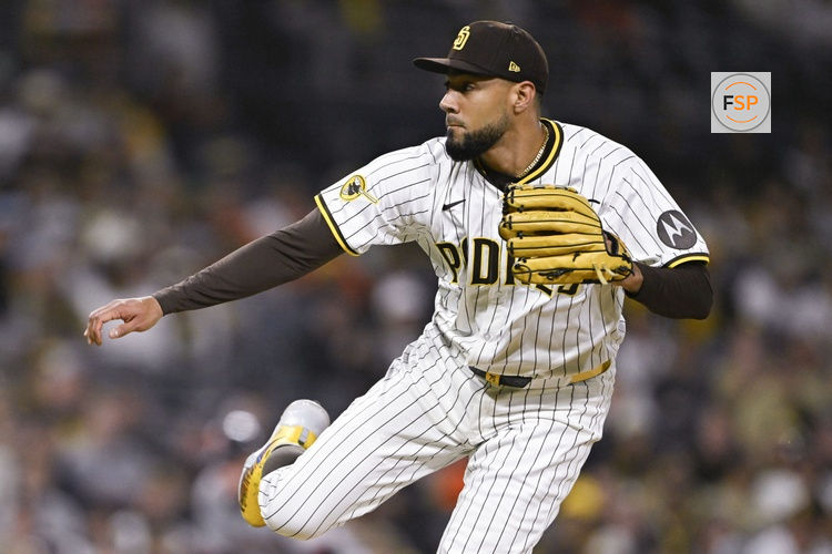 Apr 29, 2025; San Diego, California, USA; San Diego Padres pitcher Robert Suarez (75) delivers during the ninth inning against the San Francisco Giants at Petco Park. Credit: Denis Poroy-Imagn Images