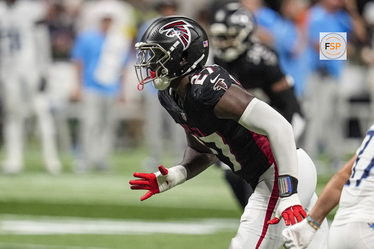 Aug 15, 2025; Atlanta, Georgia, USA; Atlanta Falcons linebacker James Pearce Jr. (27) defends against the Tennessee Titans at Mercedes-Benz Stadium. Credit: Dale Zanine-Imagn Images