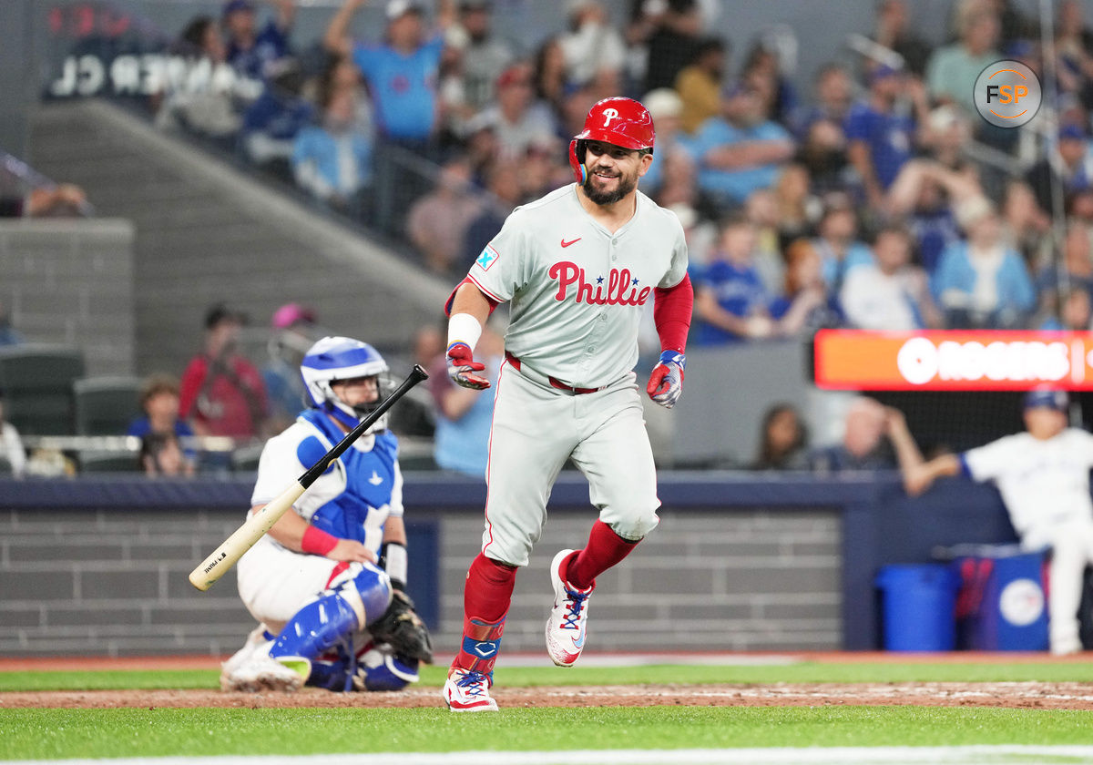 Sep 3, 2024; Toronto, Ontario, CAN; Philadelphia Phillies designated hitter Kyle Schwarber (12) reacts after hitting a three-run home run against the Toronto Blue Jays during the ninth inning at Rogers Centre. Credit: Nick Turchiaro-Imagn Images