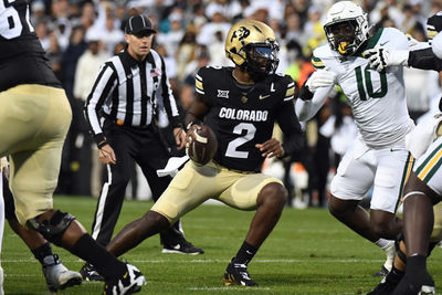 Sep 21, 2024; Boulder, Colorado, USA; Colorado Buffaloes quarterback Shedeur Sanders (2) scrambles in the pocked during the first half against the Baylor Bears at Folsom Field. Mandatory Credit: Christopher Hanewinckel-Imagn Images