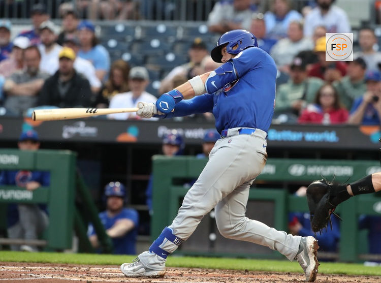 Apr 29, 2025; Pittsburgh, Pennsylvania, USA;  Chicago Cubs catcher Carson Kelly (15) hits a two-run home run against the Pittsburgh Pirates during the fourth inning at PNC Park. Credit: Charles LeClaire-Imagn Images