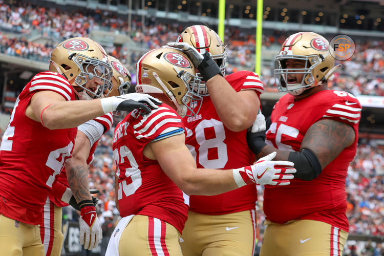 CLEVELAND, OH - OCTOBER 15: San Francisco 49ers running back Christian McCaffrey (23) celebrates with teammates after scoring on a 13-yard touchdown catch during the first quarter of the National Football League game between the San Francisco 49ers and Cleveland Browns on October 15, 2023, at Cleveland Browns Stadium in Cleveland, OH. (Photo by Frank Jansky/Icon Sportswire)