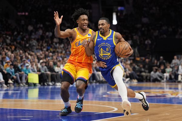 Dec 31, 2025; Charlotte, North Carolina, USA; Charlotte Hornets guard Collin Sexton (8) guards Golden State Warriors guard De'Anthony Melton (8) during the second half at Spectrum Center. Mandatory Credit: Jim Dedmon-Imagn Images