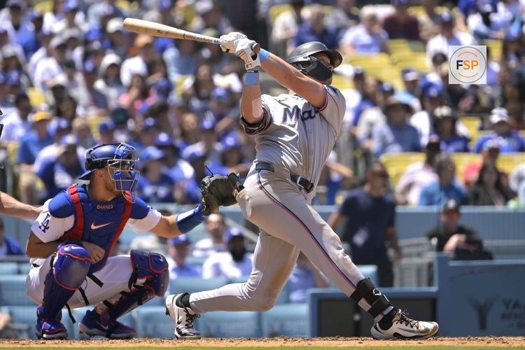Apr 30, 2025; Los Angeles, California, USA;  Miami Marlins right fielder Kyle Stowers (28) doubles in a run in the sixth inning against the Los Angeles Dodgers at Dodger Stadium. Credit: Jayne Kamin-Oncea-Imagn Images