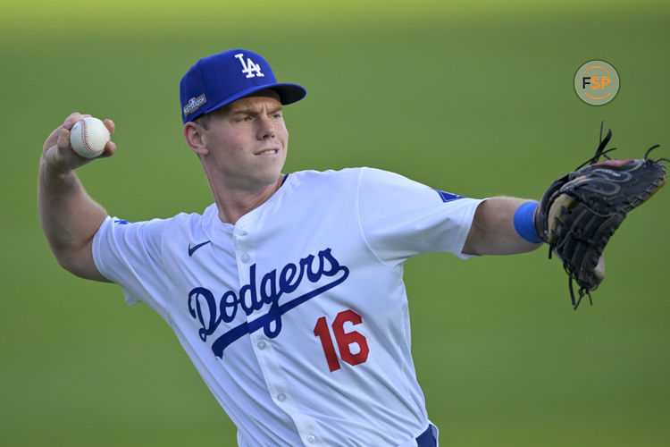 Oct 5, 2024; Los Angeles, California, USA; Los Angeles Dodgers catcher Will Smith (16) warms up before playing against the San Diego Padres in game one of the NLDS for the 2024 MLB Playoffs at Dodger Stadium. Credit: Jayne Kamin-Oncea-Imagn Images