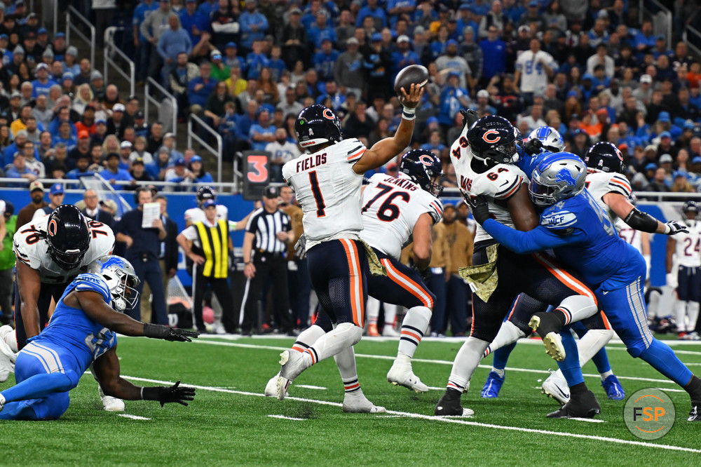 DETROIT, MI - NOVEMBER 19: Chicago Bears quarterback Justin Fields (1) gets away a pass under pressure during the Detroit Lions versus the Chicago Bears game on Sunday November 19, 2023 at Ford Field in Detroit, MI. (Photo by Steven King/Icon Sportswire)