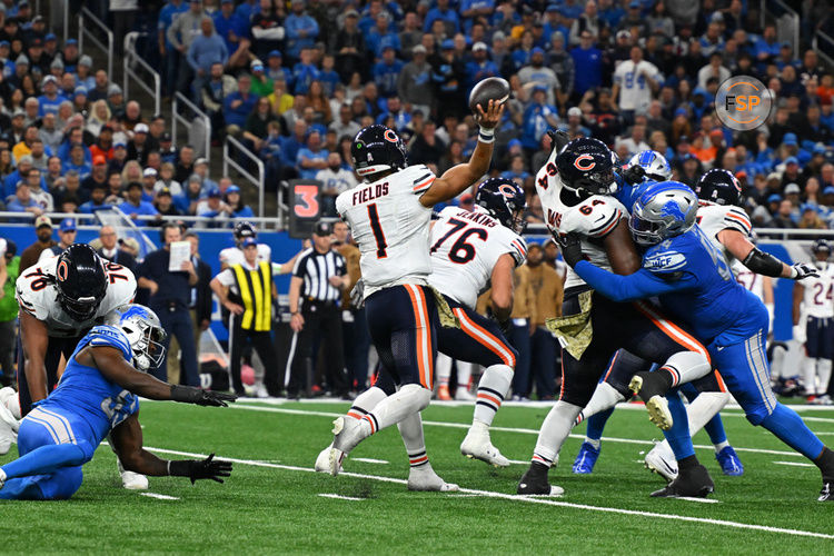 DETROIT, MI - NOVEMBER 19: Chicago Bears quarterback Justin Fields (1) gets away a pass under pressure during the Detroit Lions versus the Chicago Bears game on Sunday November 19, 2023 at Ford Field in Detroit, MI. (Photo by Steven King/Icon Sportswire)