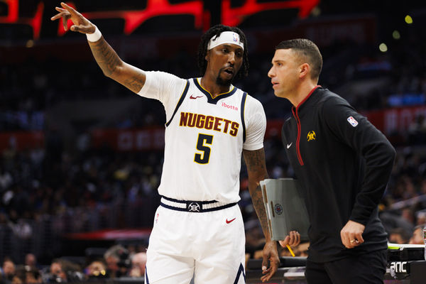 LOS ANGELES, CA - NOVEMBER 27: Denver Nuggets guard Kentavious Caldwell-Pope (5) talks with a coach during an NBA basketball game against the LA Clippers on November 27, 2023 at Crypto.com Arena in Los Angeles, CA. (Photo by Ric Tapia/Icon Sportswire)