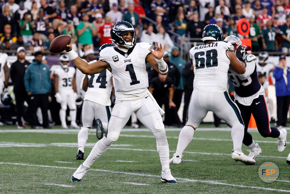 FOXBOROUGH, MA - SEPTEMBER 10: Philadelphia Eagles quarterback Jalen Hurts (1) tosses a pass during a game between the New England Patriots and the Philadelphia Eagles on September 10, 2023, at Gillette Stadium in Foxborough, Massachusetts. (Photo by Fred Kfoury III/Icon Sportswire)