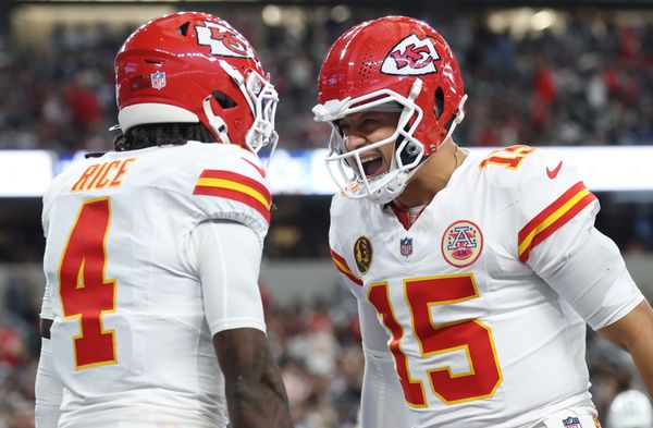Nov 27, 2025; Arlington, Texas, USA; Kansas City Chiefs wide receiver Rashee Rice (4) and Kansas City Chiefs quarterback Patrick Mahomes (15) celebrate after a play against the Dallas Cowboys during the first quarter at AT&T Stadium. Mandatory Credit: Kevin Jairaj-Imagn Images