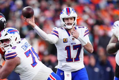 Jan 17, 2026; Denver, CO, USA; Buffalo Bills quarterback Josh Allen (17) throws a touchdown pass during the third quarter of an AFC Divisional Round playoff game against the Denver Broncos at Empower Field at Mile High. Mandatory Credit: Ron Chenoy-Imagn Images