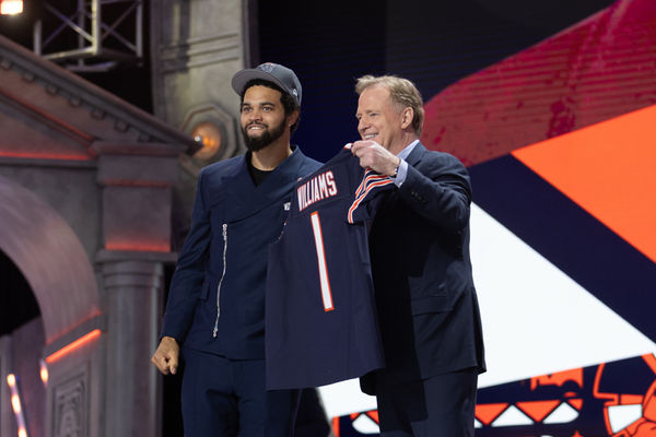 DETROIT, MI - APRIL 25: USC Quarterback Caleb Williams poses with his jersey after being taken first overall by the Chicago Bears during day 1 of the NFL Draft on April 25, 2024 at Fox Theatre in Detroit, MI. (Photo by John Smolek/Icon Sportswire)
