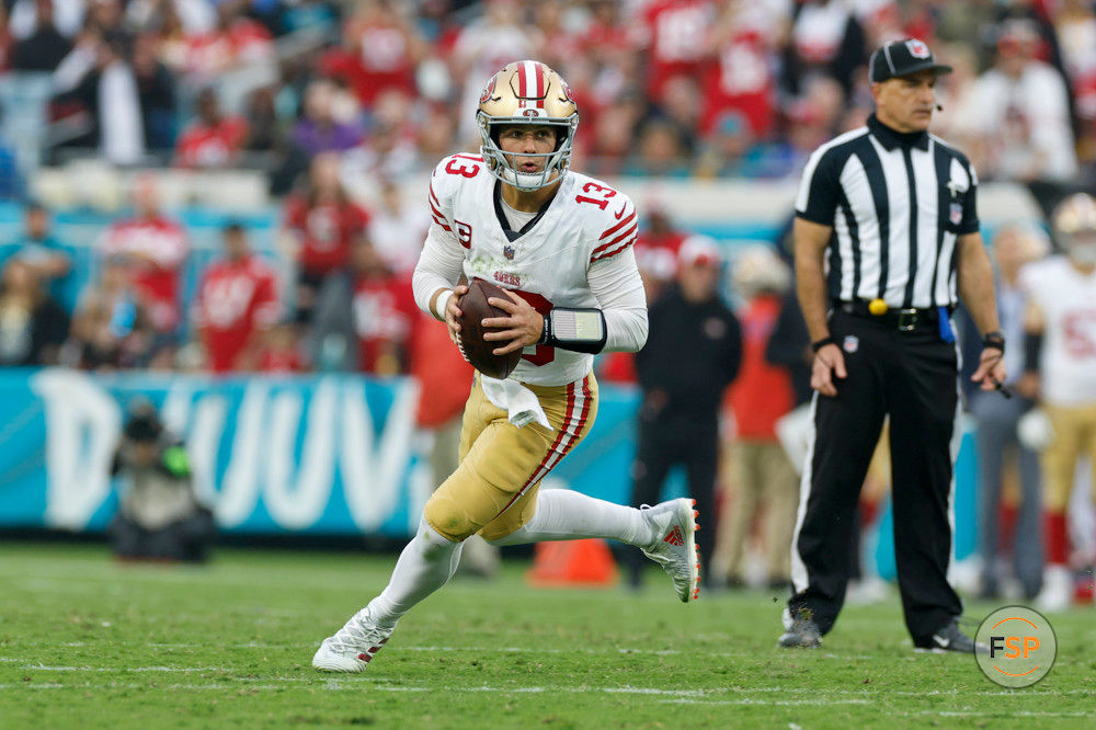 JACKSONVILLE, FL - NOVEMBER 12: San Francisco 49ers quarterback Brock Purdy (13) looks for a receiver during the game between the San Francisco 49ers and the Jacksonville Jaguars on November 12, 2023 at  EverBank Stadium in Jacksonville, Florida. (Photo by David Rosenblum/Icon Sportswire)