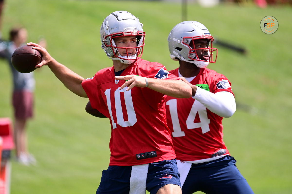 Jun 12, 2024; Foxborough, MA, USA;  New England Patriots quarterback Drake Maye (10) and quarterback Jacob y Brissett (14)  throw passes at minicamp at Gillette Stadium.  Credit: Eric Canha-USA TODAY Sports