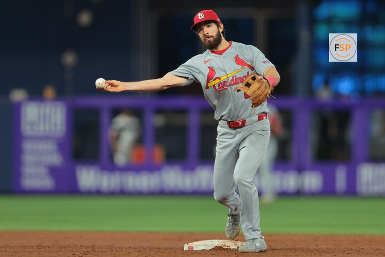 Apr 22, 2026; Miami, Florida, USA; St. Louis Cardinals shortstop Thomas Saggese (25) turns a double play against the Miami Marlins during the sixth inning at loanDepot Park. Credit: Sam Navarro-Imagn Images