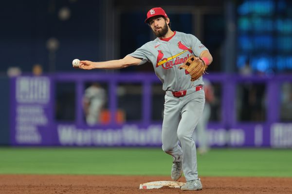 Apr 22, 2026; Miami, Florida, USA; St. Louis Cardinals shortstop Thomas Saggese (25) turns a double play against the Miami Marlins during the sixth inning at loanDepot Park. Mandatory Credit: Sam Navarro-Imagn Images