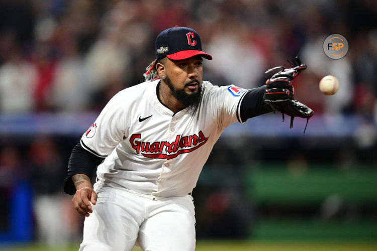 Oct 18, 2024; Cleveland, Ohio, USA; Cleveland Guardians pitcher Emmanuel Clase (48) fields the ball in the ninth inning against the New York Yankees during game four of the ALCS for the 2024 MLB playoffs at Progressive Field. Credit: David Dermer-Imagn Images