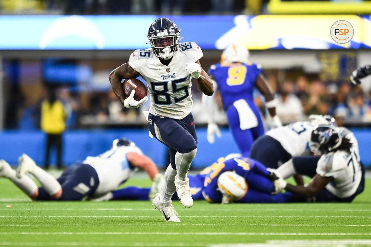 INGLEWOOD, CA - DECEMBER 18: Tennessee Titans tight end Chigoziem Okonkwo (85) runs up field after a catch during the NFL regular season game between the Tennessee Titans and the Los Angeles Chargers on December 18, 2022, at SoFi Stadium in Inglewood, CA. (Photo by Brian Rothmuller/Icon Sportswire)
