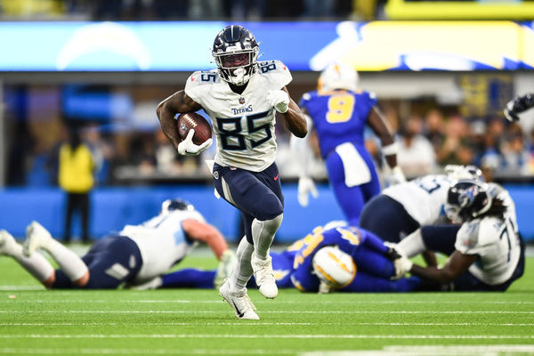 INGLEWOOD, CA - DECEMBER 18: Tennessee Titans tight end Chigoziem Okonkwo (85) runs up field after a catch during the NFL regular season game between the Tennessee Titans and the Los Angeles Chargers on December 18, 2022, at SoFi Stadium in Inglewood, CA. (Photo by Brian Rothmuller/Icon Sportswire)
