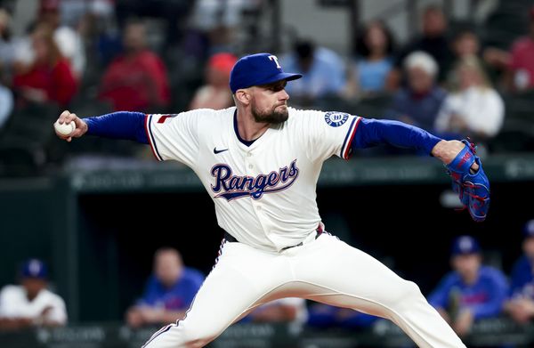 Apr 30, 2025; Arlington, Texas, USA;  Texas Rangers starting pitcher Nathan Eovaldi (17) throws during the first inning against the Oakland Athletics at Globe Life Field. Mandatory Credit: Kevin Jairaj-Imagn Images
