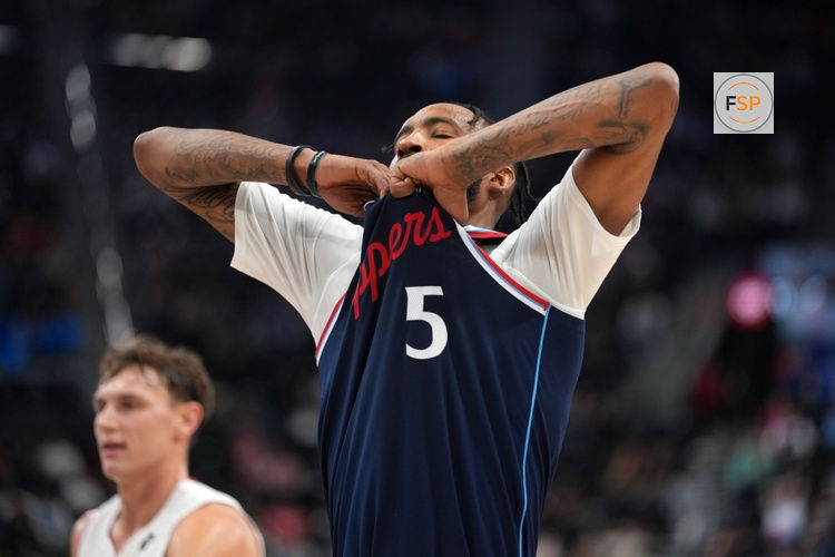Nov 3, 2025; Inglewood, California, USA; LA Clippers forward Derrick Jones Jr. (5) reacts against the Miami Heat in the second half at Intuit Dome. Credit: Kirby Lee-Imagn Images