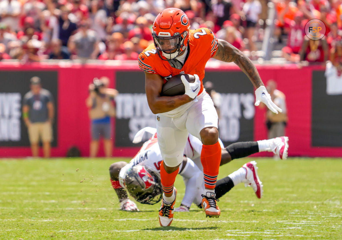 TAMPA, FL - SEPTEMBER 17: Chicago Bears wide receiver DJ Moore (2) breaks the tackle and runs for a big gain during the NFL Football match between the Tampa Bay Buccaneers and Chicago Bears on September 17, 2023 at TIAA Bank Field Stadium, FL. (Photo by Andrew Bershaw/Icon Sportswire)