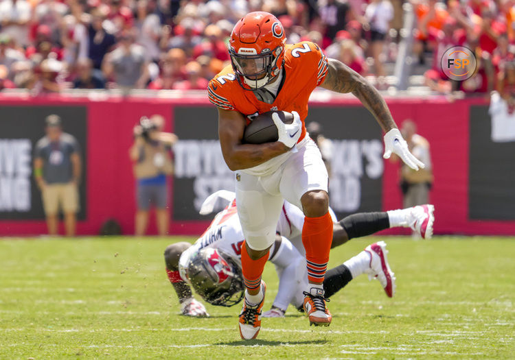 TAMPA, FL - SEPTEMBER 17: Chicago Bears wide receiver DJ Moore (2) breaks the tackle and runs for a big gain during the NFL Football match between the Tampa Bay Buccaneers and Chicago Bears on September 17, 2023 at TIAA Bank Field Stadium, FL. (Photo by Andrew Bershaw/Icon Sportswire)