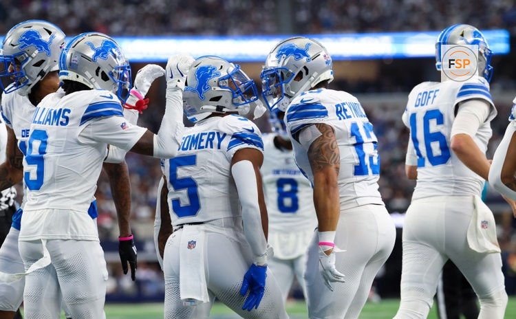 Oct 13, 2024; Arlington, Texas, USA;  Detroit Lions running back David Montgomery (5) and Detroit Lions running back Craig Reynolds (13) and Detroit Lions wide receiver Jameson Williams (9) celebrate a touchdown during the first quarter against the Dallas Cowboys at AT&T Stadium. Credit: Kevin Jairaj-Imagn Images