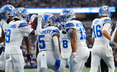 Oct 13, 2024; Arlington, Texas, USA;  Detroit Lions running back David Montgomery (5) and Detroit Lions running back Craig Reynolds (13) and Detroit Lions wide receiver Jameson Williams (9) celebrate a touchdown during the first quarter against the Dallas Cowboys at AT&T Stadium. Mandatory Credit: Kevin Jairaj-Imagn Images